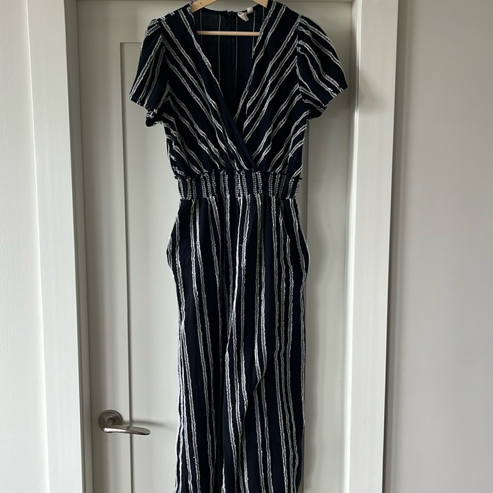Anthropologie jumpsuit with pockets and back zipper